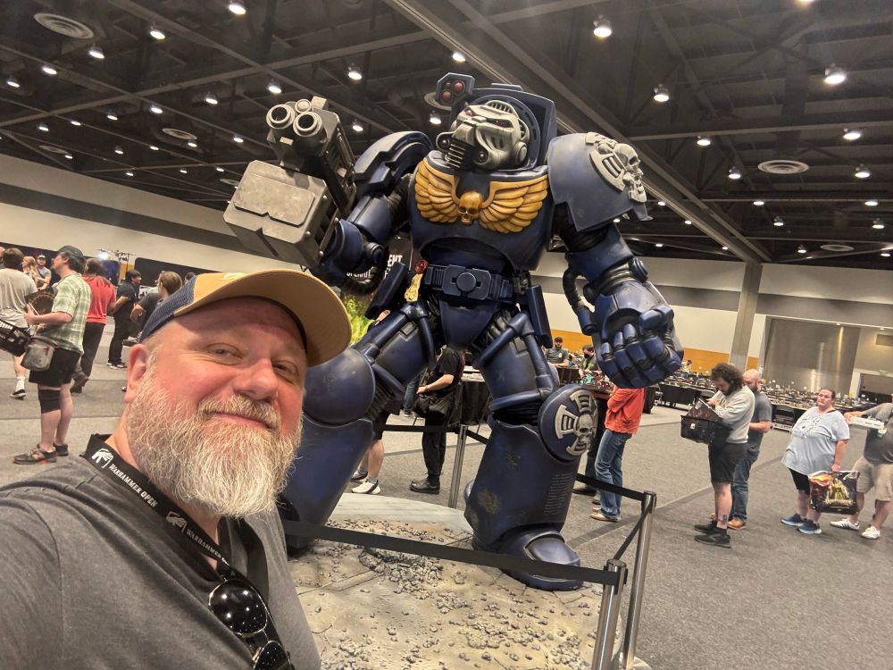 Selfie on the tournament floor for the Tacoma Open in front of a massive Ultramarine Terminator statue.