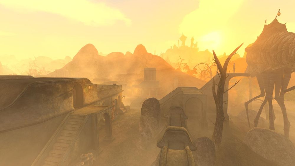 The morning sun rises above the Dwemer towers of Arkngthund on the horizon, golden rays highlighting the strider port and city streets of Balmora.  A silt strider dominates the right-side of the screen, while the façade of the Lucky Lockup tavern is illuminated by the sun's morning light.