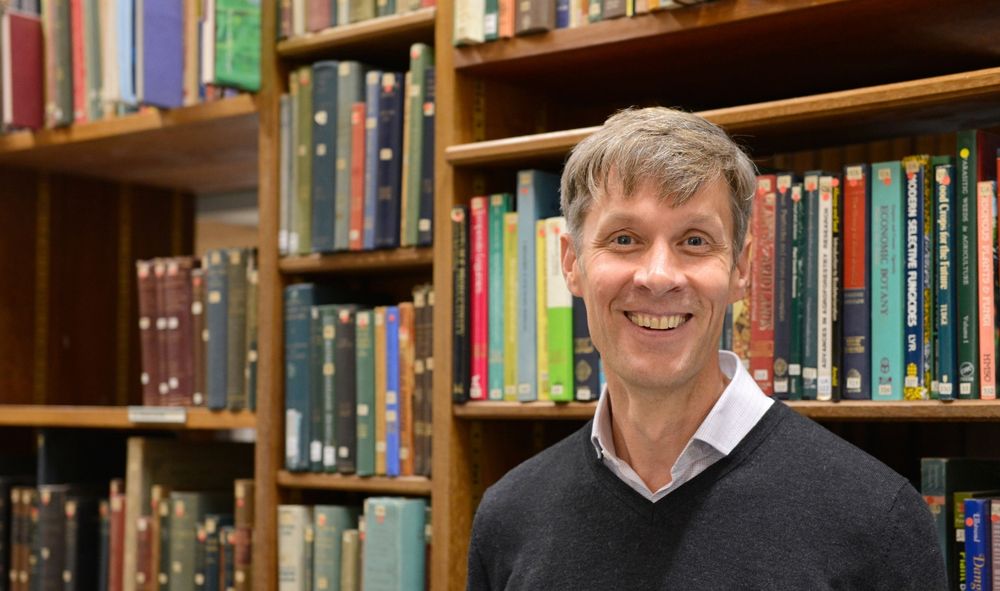 Professor Julian Hibberd in the Department of Plant Science library. Photo by Andrew Benton.
