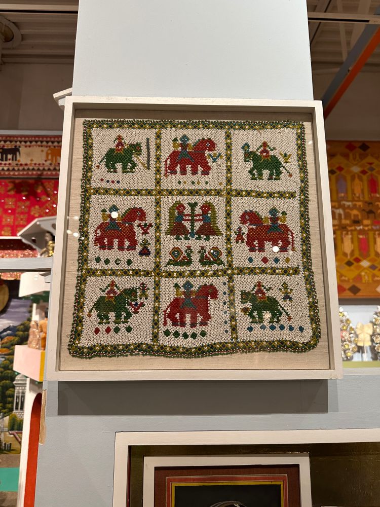 beaded art of people on horses