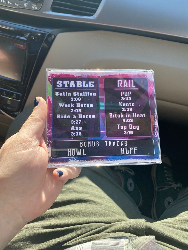 the back of a furry produced CD. the song titles are all very campy furry things.