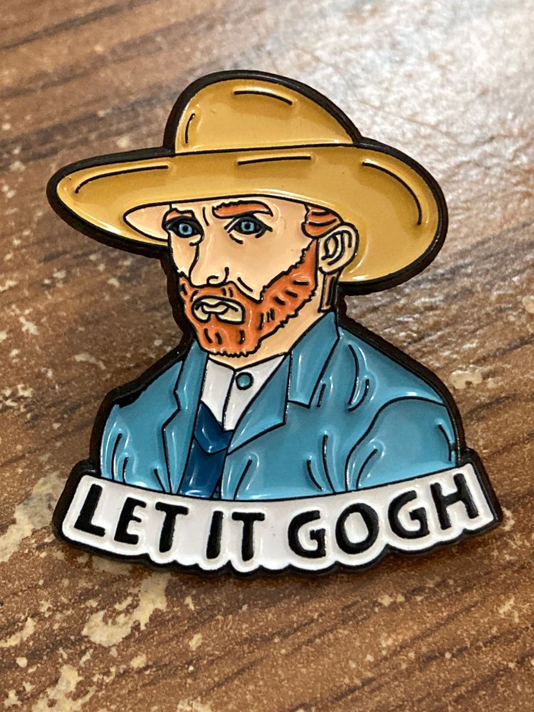 A metal pin of Vincent Van Gogh, head and shoulders, wearing a hat.  Text banner on the pin reads Let It Gogh