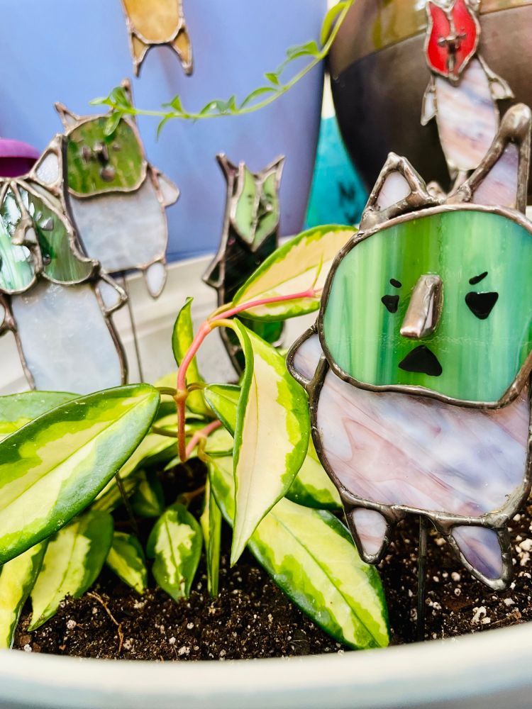 Stained glass Korok plant stakes in a plant