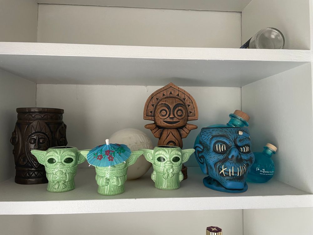 Shelf with tiki mugs