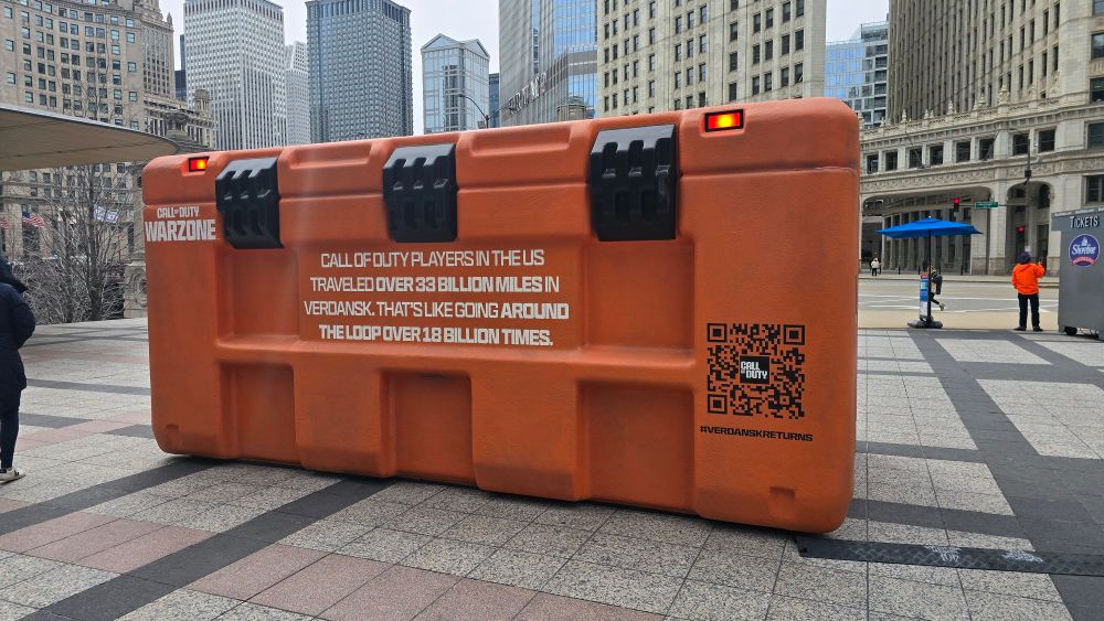 Back picture of a big orange box. There's some marketing text on it