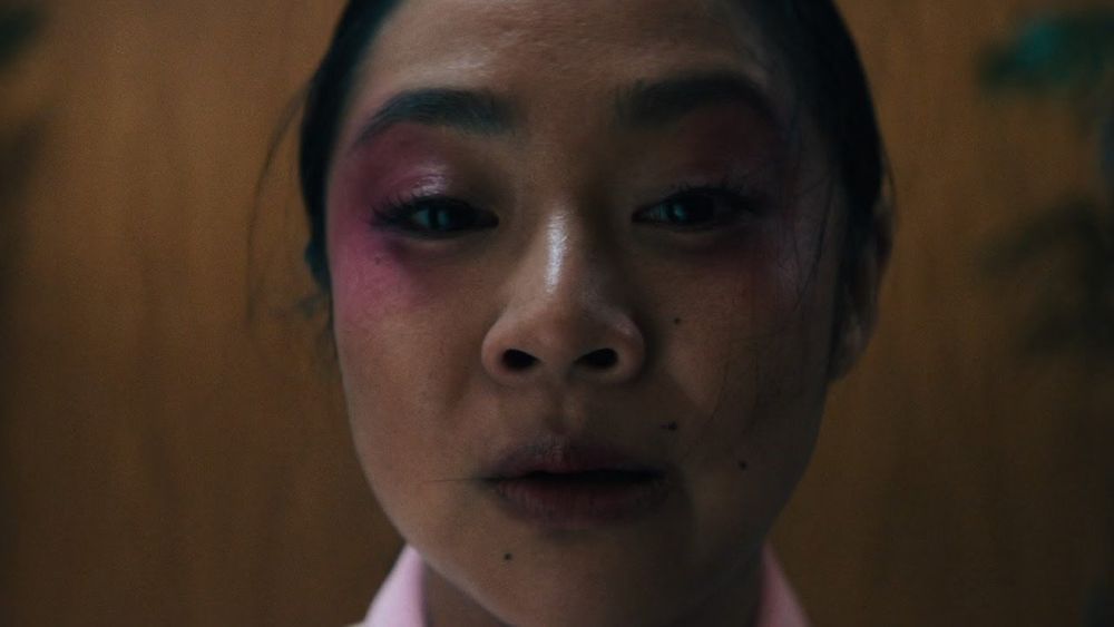 still from the film "Everything Everywhere All At Once". a close-up shot of Jobu Tupaki's face as she introduces Evelyn to The Bagel, speaking the lines which are misquoted in this post and the previous post.