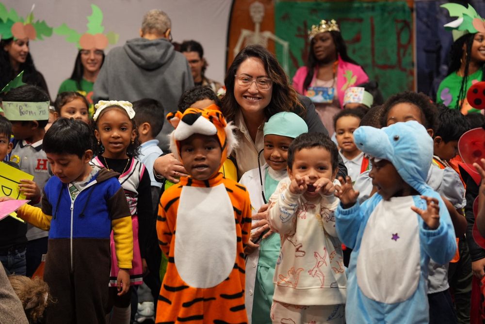 Chancellor Aviles-Ramos visits P.S. 345K for a Halloween celebration with students in costume.