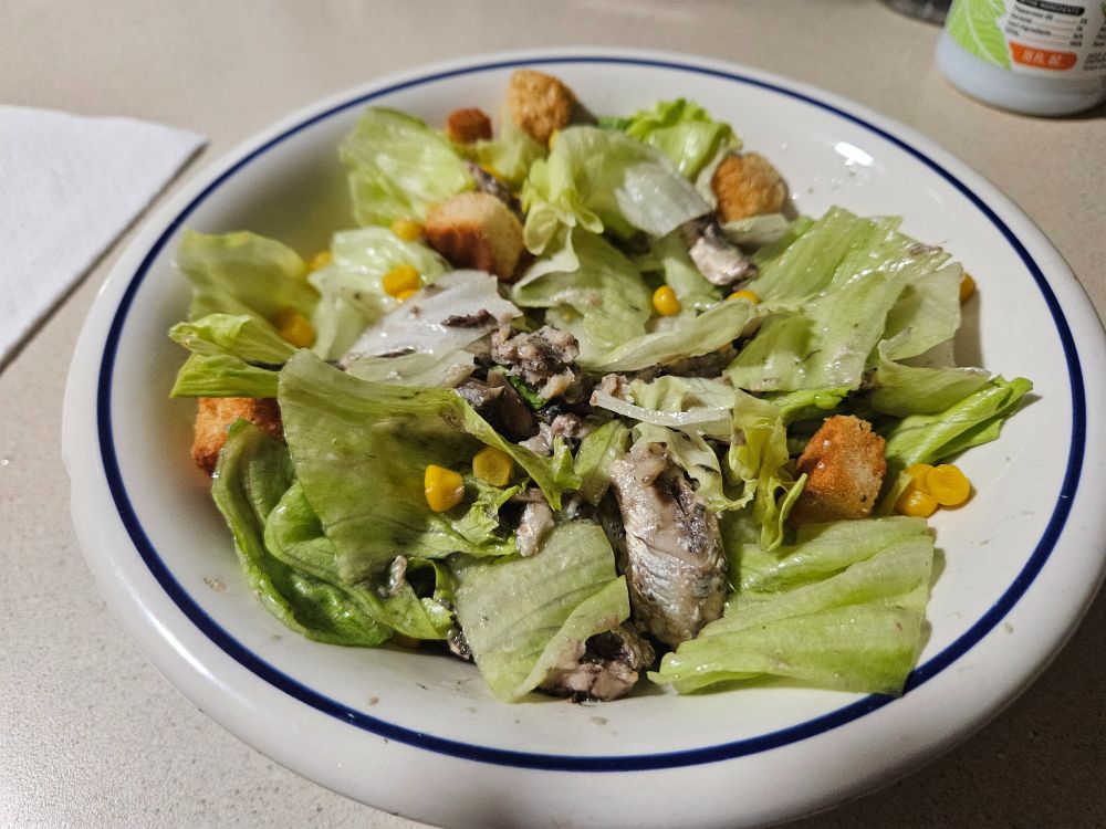 Sardine salad with corn and croutons