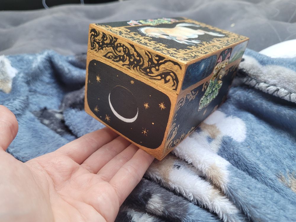 Other side of the box with a crescent moon