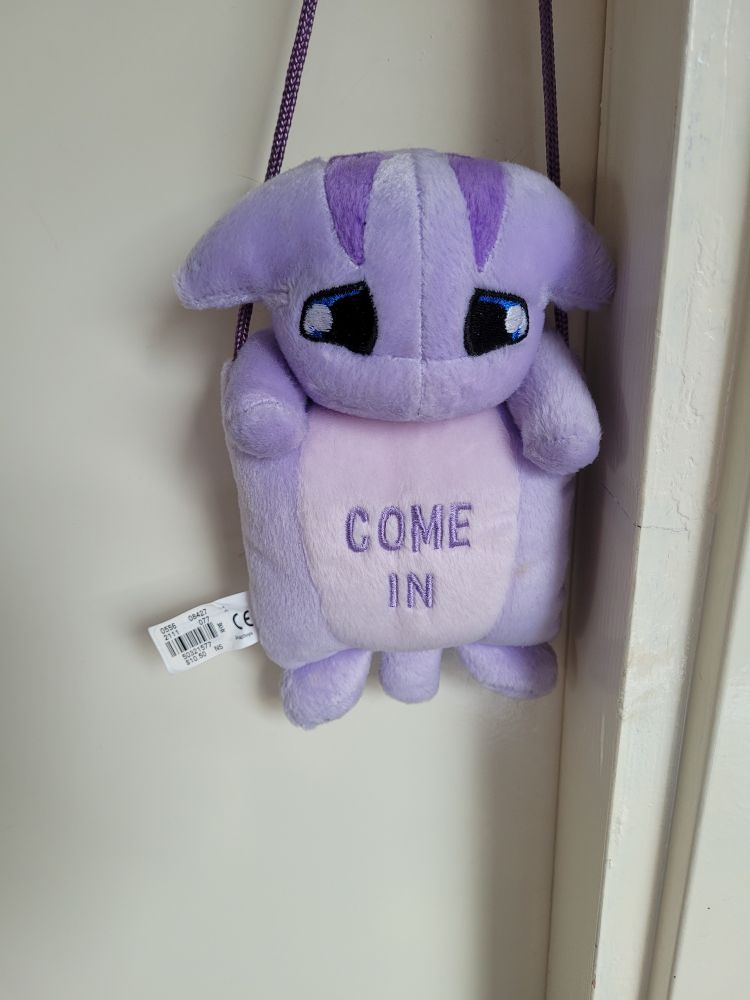 Poogle door hanger from the front 'come in'