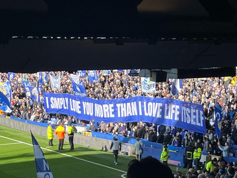 Banner saying “I simply love you more than I love life itself” at Goodison Park. I’m holding the pole under “you”