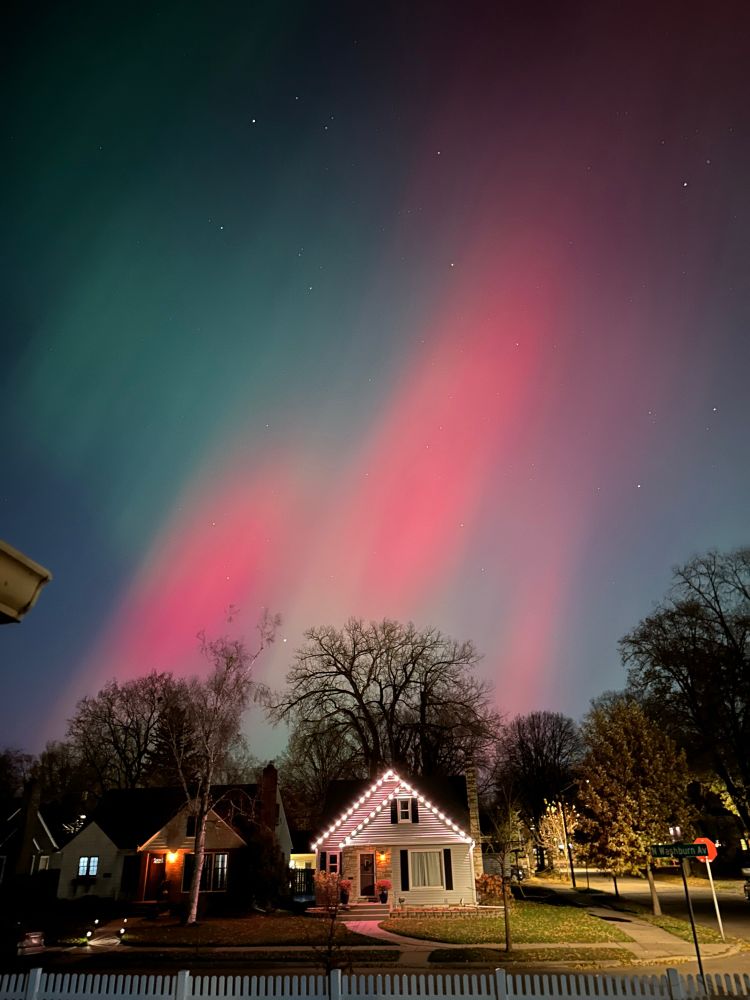 Aurora over a house