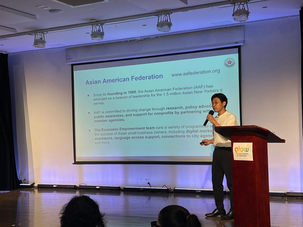 Asian American Federation staff presenting about the organization and its services. 