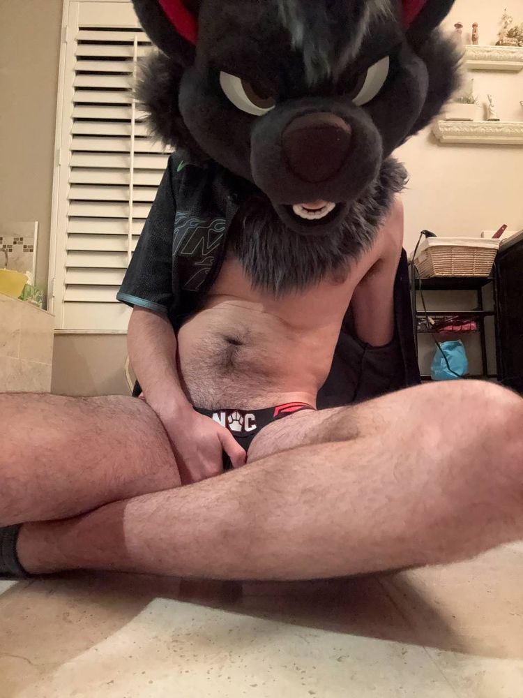 dac has his jersey slipping off, exposing his bare chest and his jock