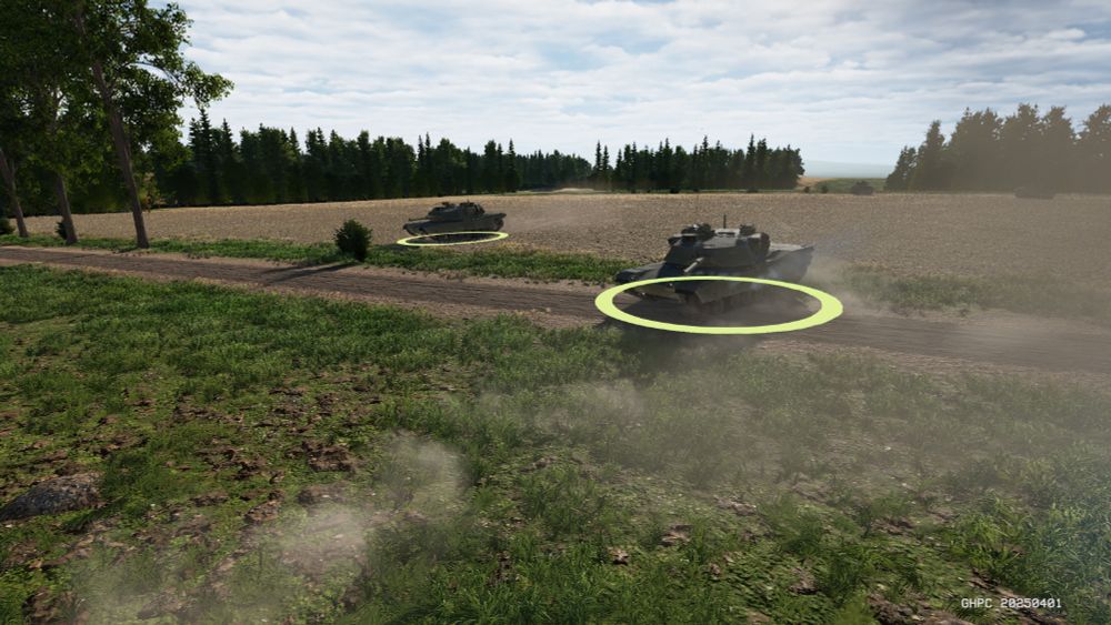 Two American M1 Abrams tanks advance across open German countryside with the sun behind them. Selection circles are visible around each vehicle as part of the real-time strategy mode.