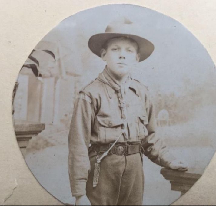 Young boy in Boy Scout uniform circa 1914