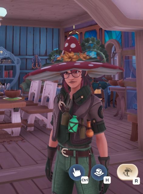 Redria64 in Palia, a femme character with round glasses, a bandolier of potions atop a brown bomber jacket, green pants, and a red toadstool patterned witch hat