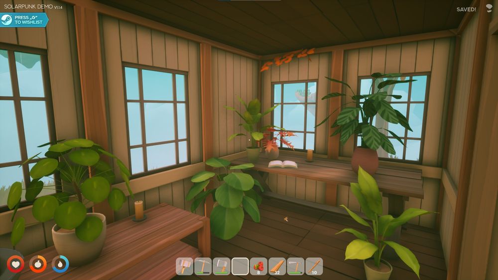 the greenhouse of redria's solarpunk build, containing a desk with candles and a book, and many assorted potted plants