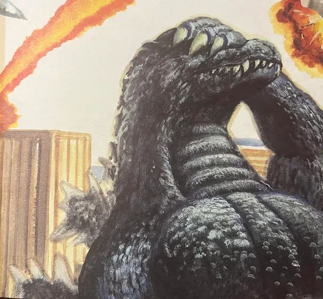 A color illustration of Godzilla doing a facepalm.
