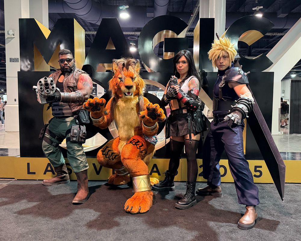 Cloud, Barret, Tifa, and Red XIII cosplayers pose in battle stances in front of a sign that says MAGIC CON Las Vegas 2025.