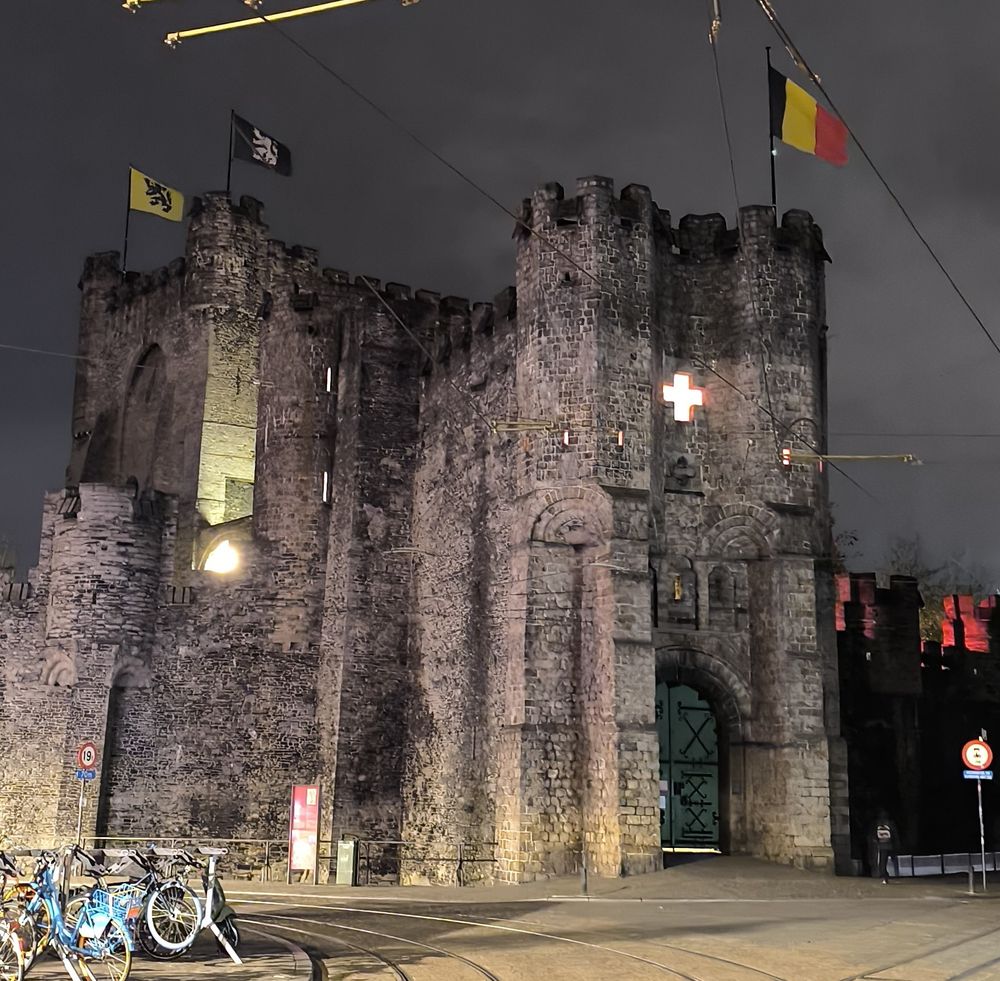 The castle Gravensteen in gent Belgium looking moody in the darkness just before dawn
