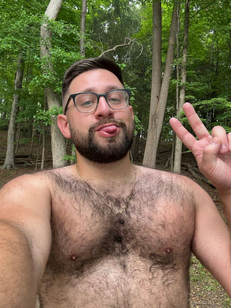 Selfie of me in the woods with trees behind me