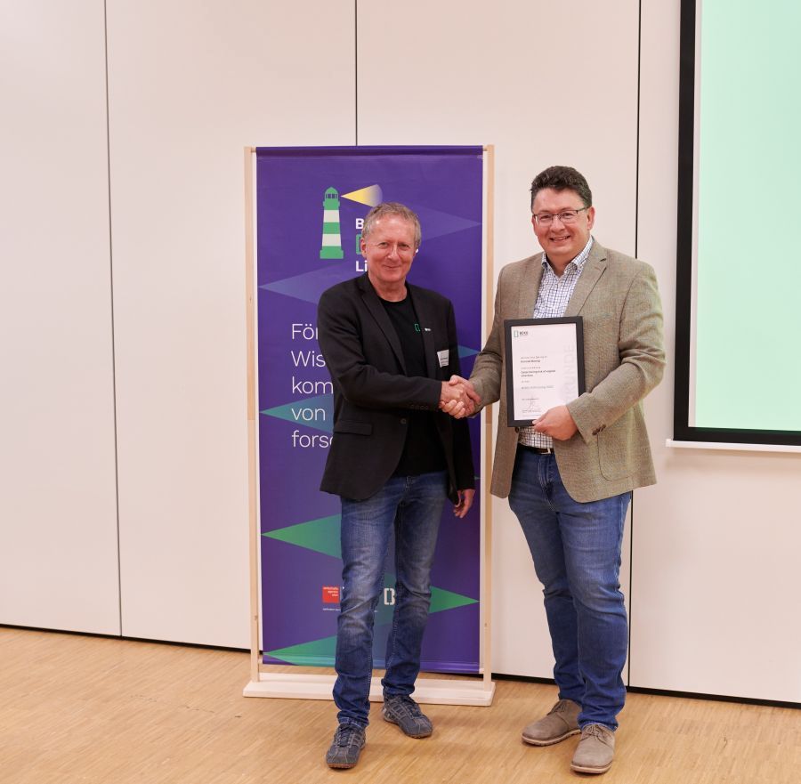 Von links: Vizerektor Christian Obinger, Konrad Domig