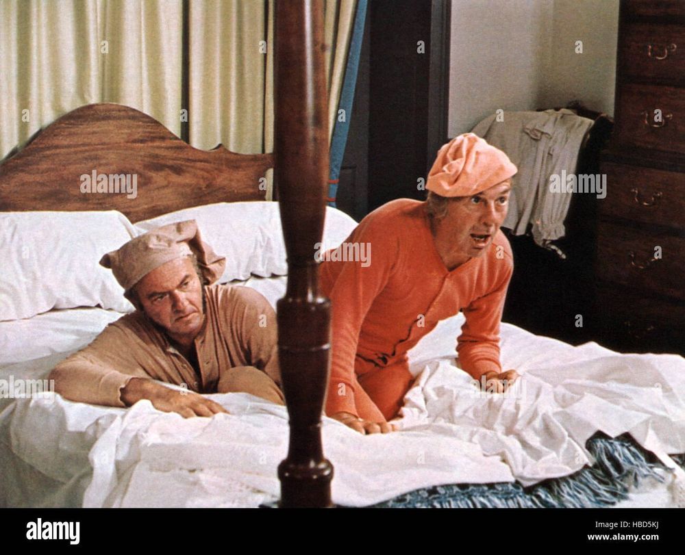A still from Huckleberry Finn (1974) The King (Harvey Korman) and the Duke (David Wayne) are falling through a bed while dressed in their pajamas