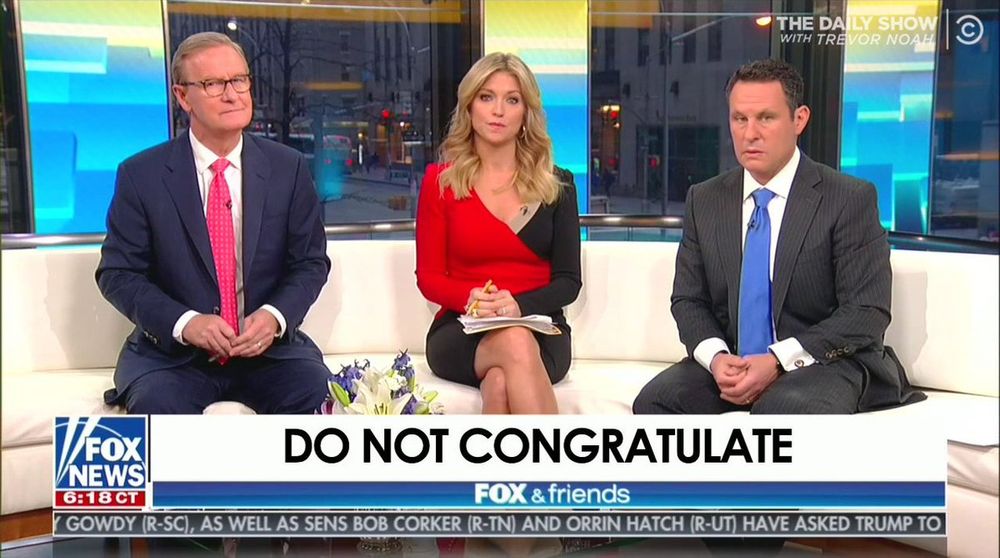 A screencap of three standard issue white people on Fox News with a chyron that reads "DO NOT CONGRATULATE"