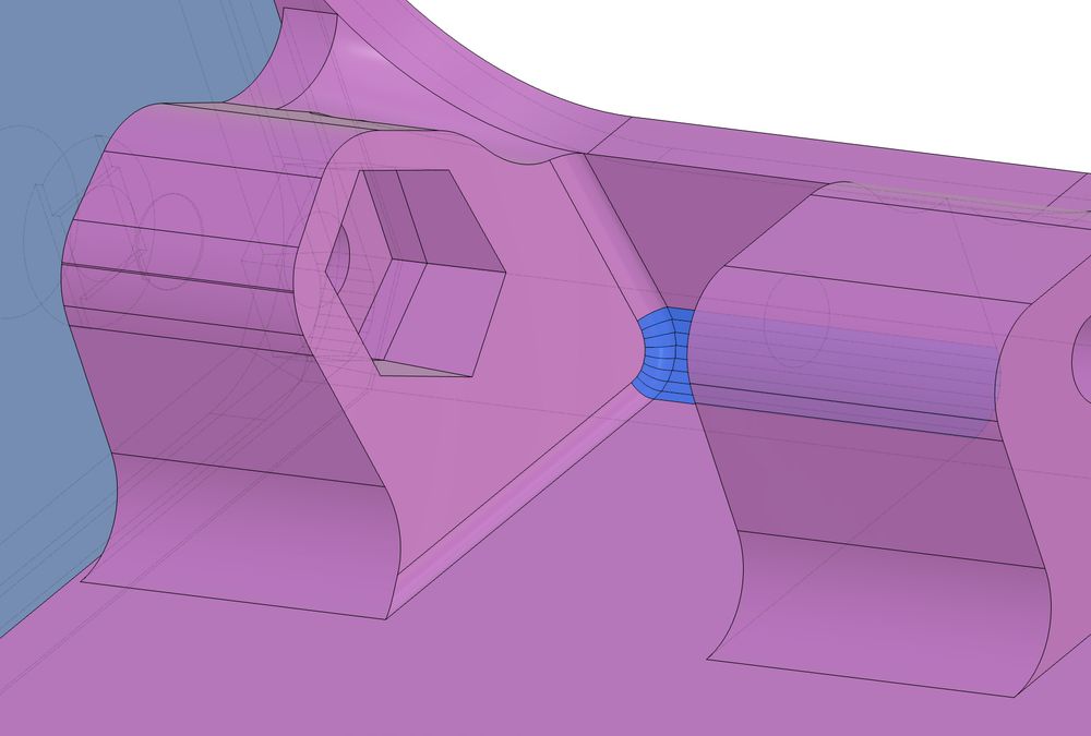 3d CAD showing a rounded surface, that is made up small flat planes, rather than a continuous arc. A fillet has created awkward joins to these flat planes.