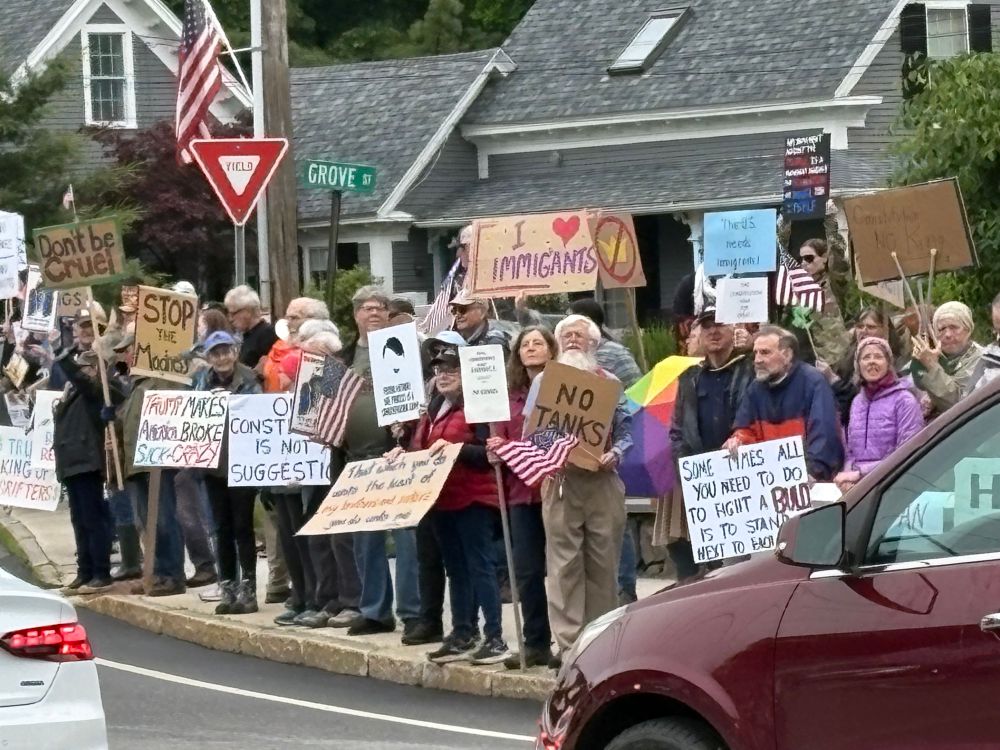 Crowd with sign saying No Tanks
