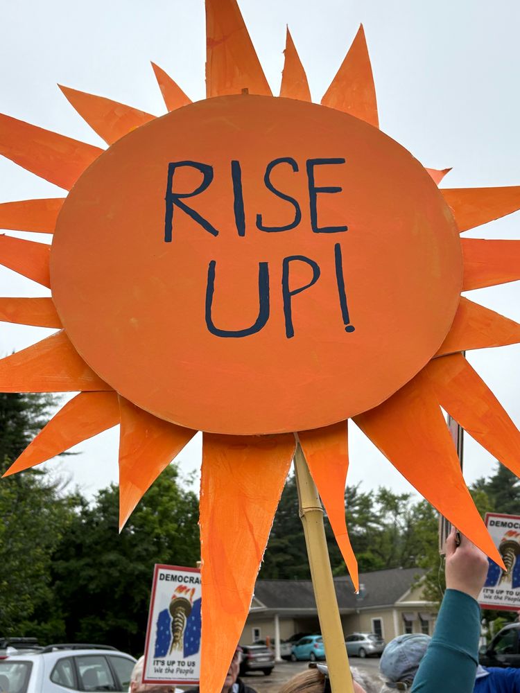 Sun shaped sign