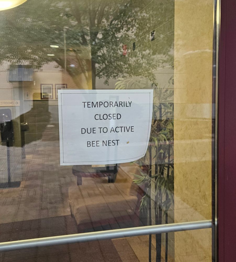 The restrooms are closed due to an active bee nest. 