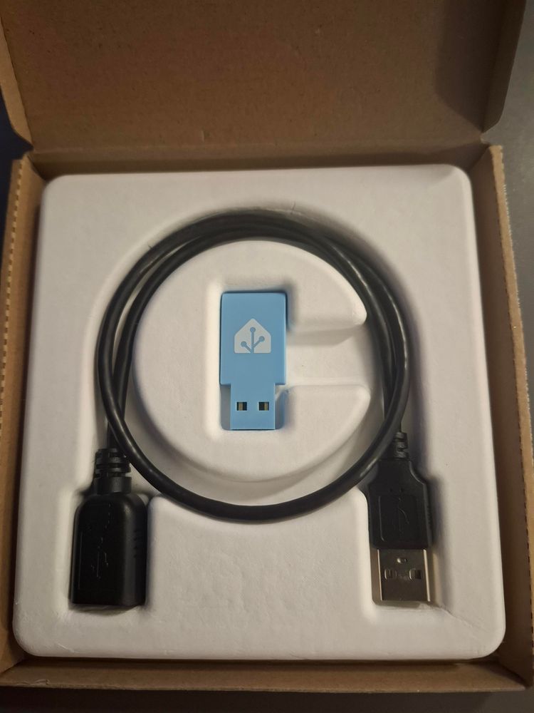Box with a Home Assistant Connect ZBT-1 stick and a USB extension cable.