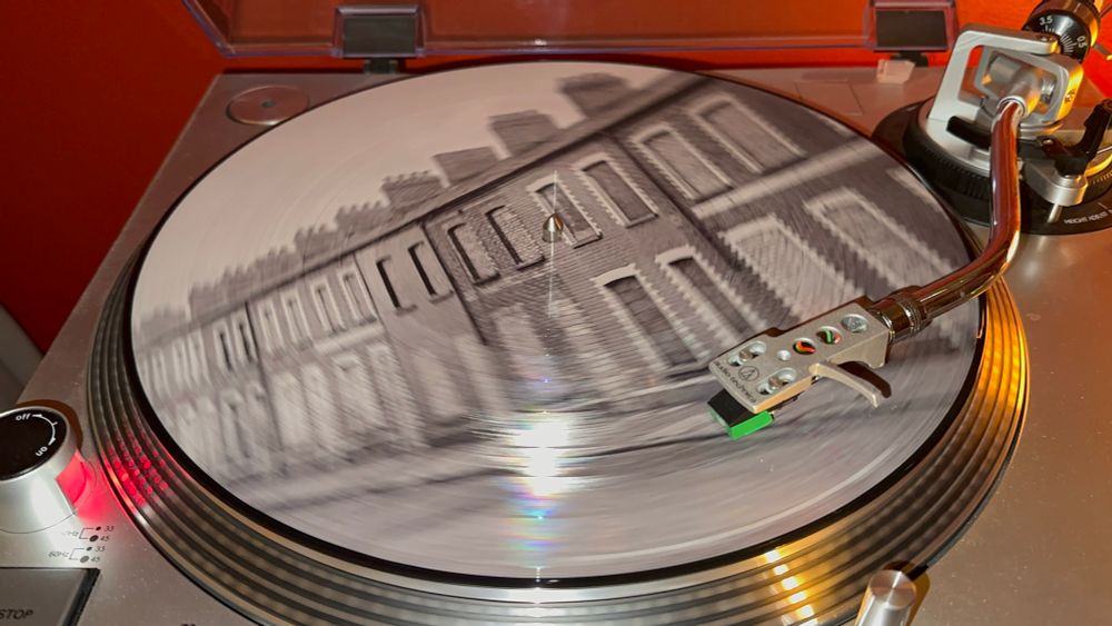 Spinning record of the Manic Street Preachers - Critical Thinking - Side B - the picture disc looks like the houses on Coronation Street