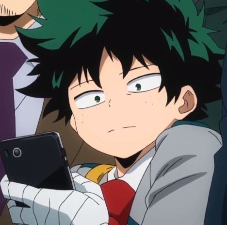 Deku from My Hero Academia looking tiredly at his phone 