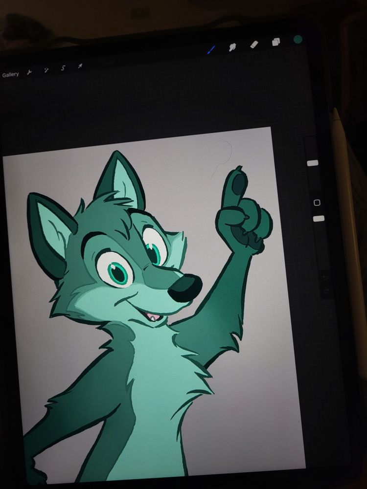 Photo of my ipad showing part of the digitally colored version of one of the poses of Greeny; a green cartoon wolf pointing up a finger. 