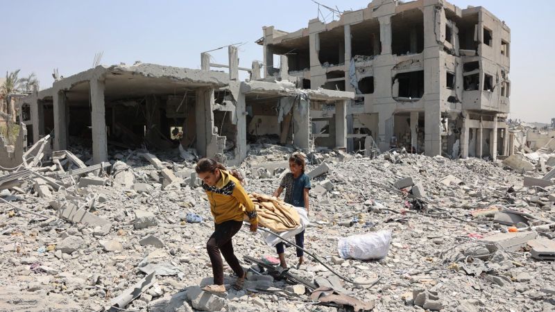 
  

<article data-history-node-id="427259" about="https://www.middleeasteye.net/live-blog/live-blog-update/israel-kills-22-gaza-including-13-shot-dead-waiting-collect-food-aid" class="live-blog-update default clearfix">

  
      <h2>
      <a href="https://www.middleeasteye.net/live-blog/live-blog-update/israel-kills-22-gaza-including-13-shot-dead-waiting-collect-food-aid" rel="bookmark">
<span class="field field-title">Israel kills 22 in Gaza, including 13 shot dead waiting to collect food aid</span>
</a>
    </h2>
    

        
    <div class="content">
                <div class="field field-field-text"><p>Gaza's civil defence agency has said that Israeli attacks killed at least 22 people on Saturday.</p>

<p>According to the agency, at least 13 of the Palestinians killed were shot by troops as they were waiting to collect food aid near distribution sites in the north and in the south.</p>

<p>Civil defence spokesman Mahmud Bassal told AFP that conditions in the Zeitun neighbourhood in Gaza City were rapidly deteriorating, with residents having little to no access to food and water due to heavy Israeli bombardment. He said Israel were carrying out ethnic cleansing there.&nbsp;</p>

<p>Bassal said about 50,000 people are estimated to be in the area, "the majority of whom are without food or water" and lacking "the basic necessities of life".</p>

<p>Earlier this month, Prime Minister Benjamin Netanyahu's security cabinet approved plans to sieze control of Gaza City, one of the most densely populated parts of the territory.</p>

<p>Read more:&nbsp;</p>
</div>
      
  </div>

</article>
