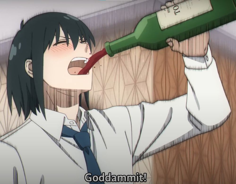 man drinking in despair