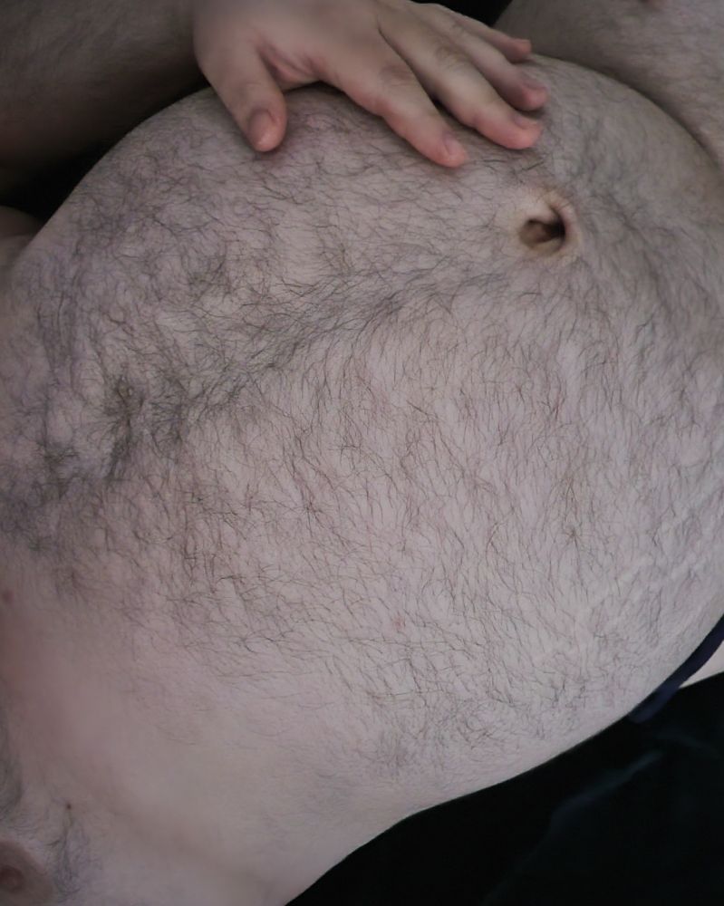 A very full fuzzy belly. The pizzas are in fact in here.