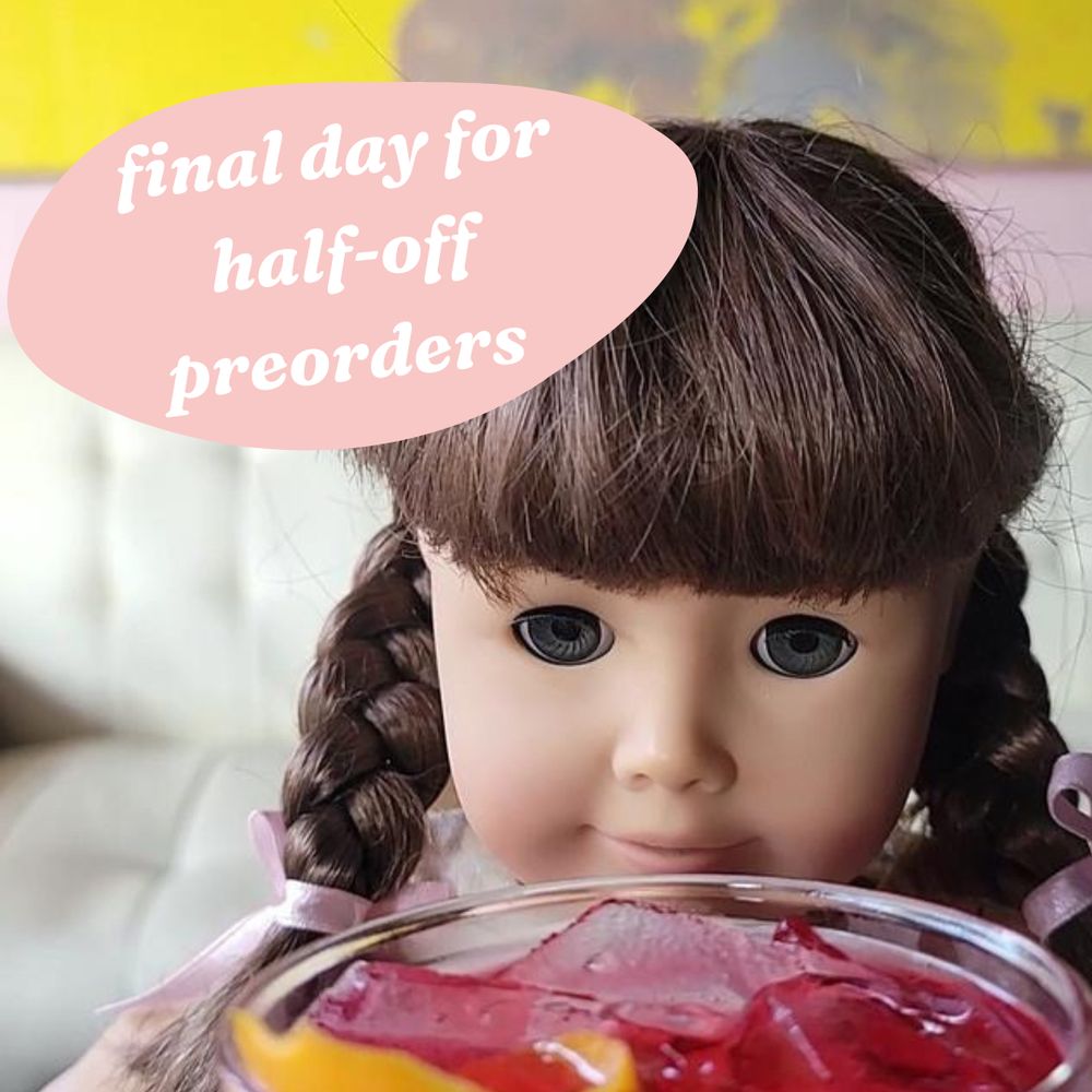 An American girl doll (Molly) sitting very close to a negroni. A pink bubble with white text above her head says “final day for half-off preorders” 
