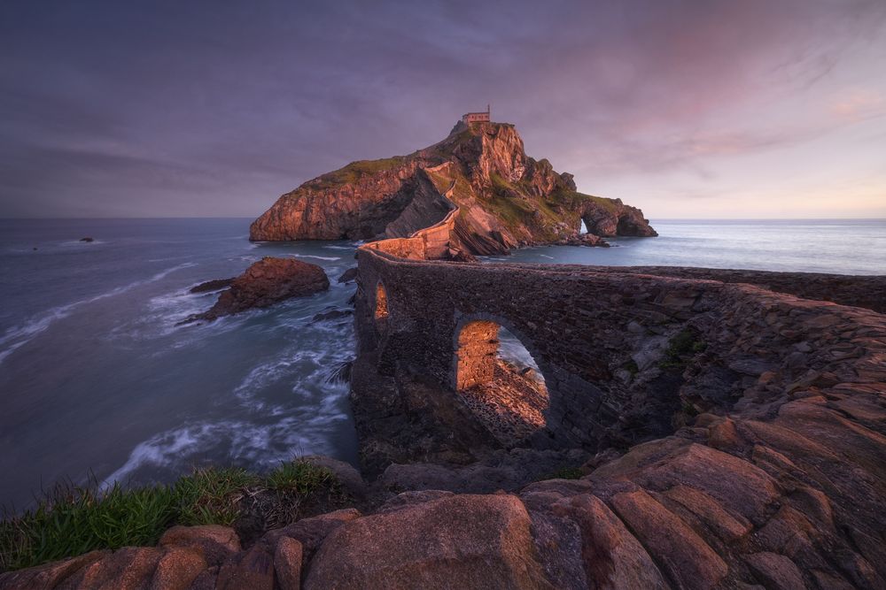 A view of the coast of northern Spain at one of the most mystical places in the Basque Country. The island of San Juan de Gaztelugatxe was used as a location for Dragonstone in the series Game of Thrones.