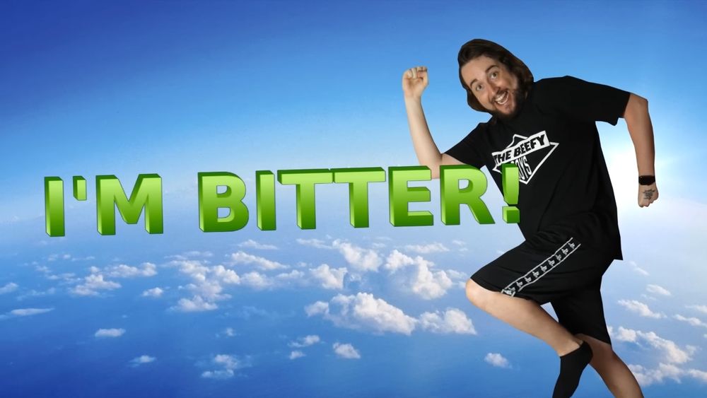 Caddicarus jumping in the sky with the text "I'M BITTER!" on the screen