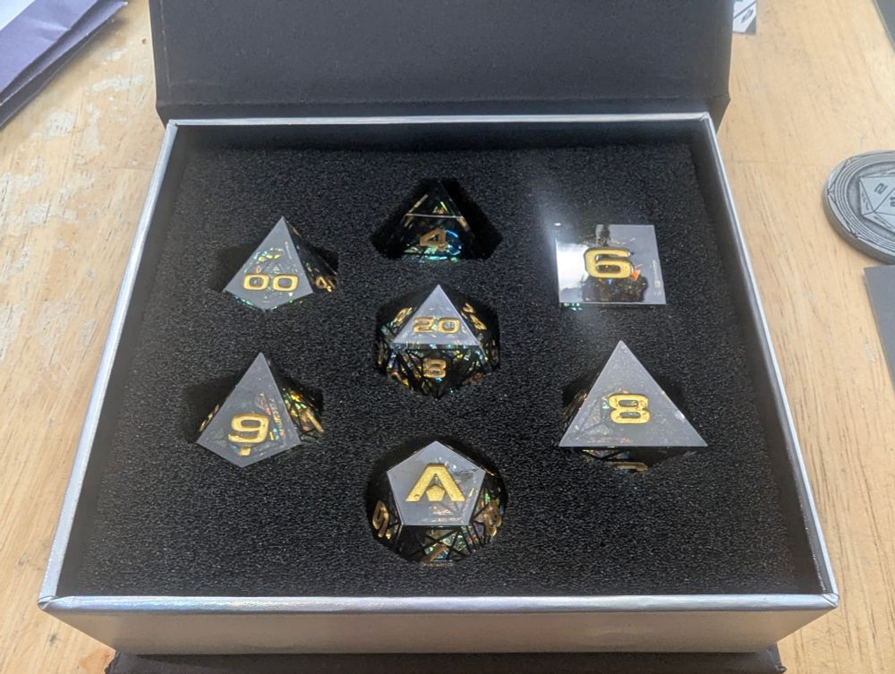 The dice all neatly packaged inside the box. 