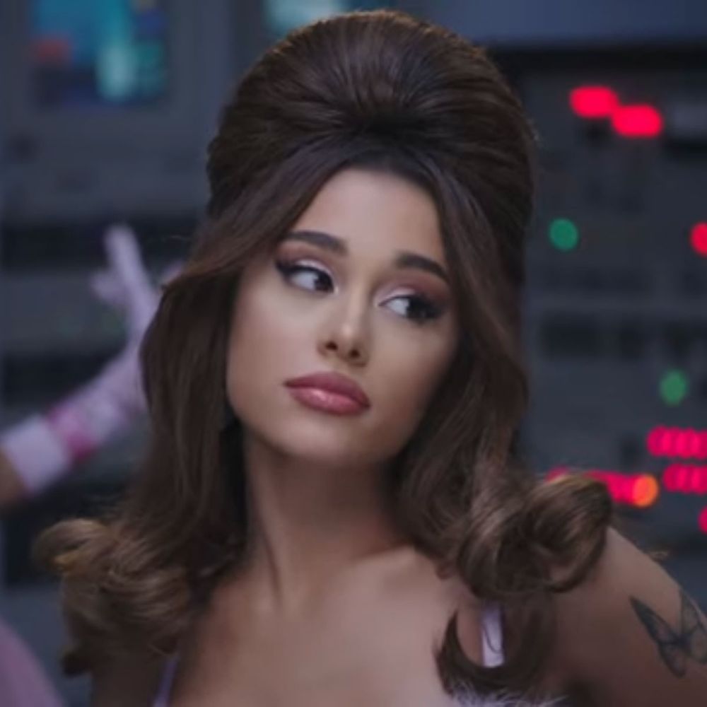 Ariana Grande from the 34+35 music video. she does have a sickening beehive hairstyle though 
