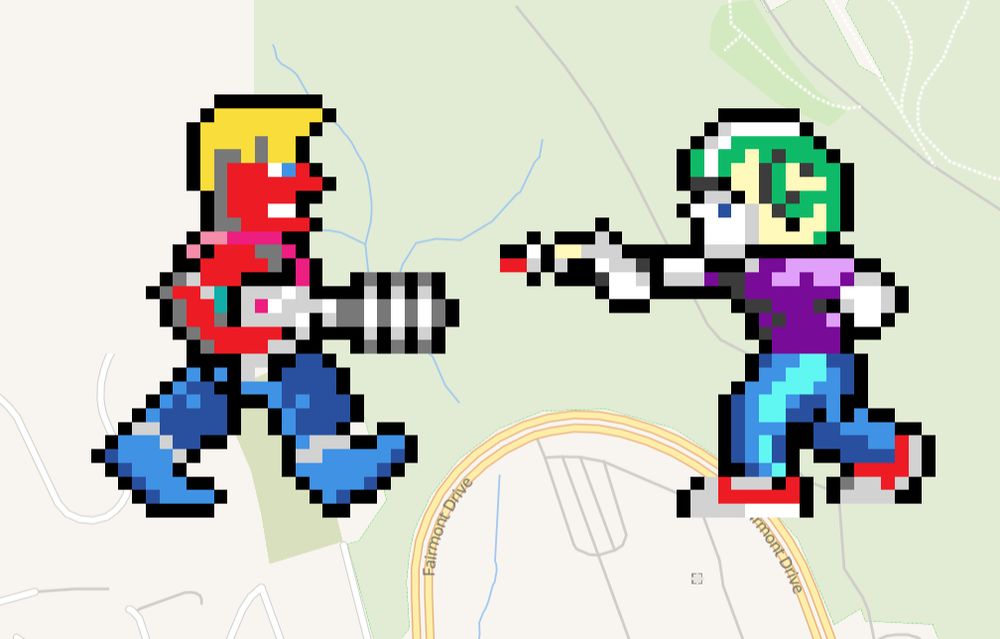 a screenshot of wplace.live, showing two sprites from Duke Nukem (1) and Commander Keen 4