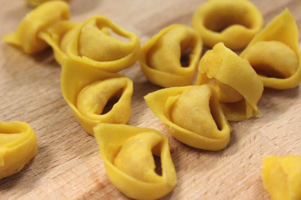 Tortellini on a wooden surface