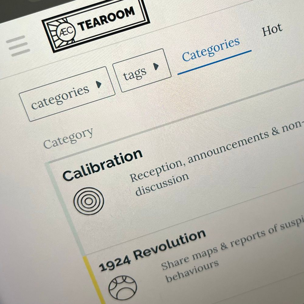 Close up of a website with a logo at the top that says 'ÆC Tearoom' and two headings visible that say 'Calibration' and '1924 Revolution'