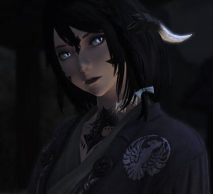 Headshot of Ota Yoshimoto, an Au Ra with blue eyes, black hair, and black and white scales.