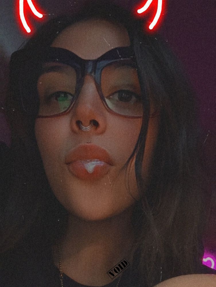 Void with a devil filter on and they have spit coming out of their mouth, they are looking down at the camera.